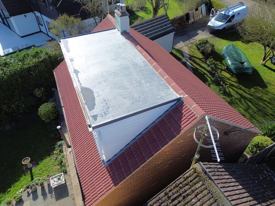 Drone view of a new flat roof on a dormer