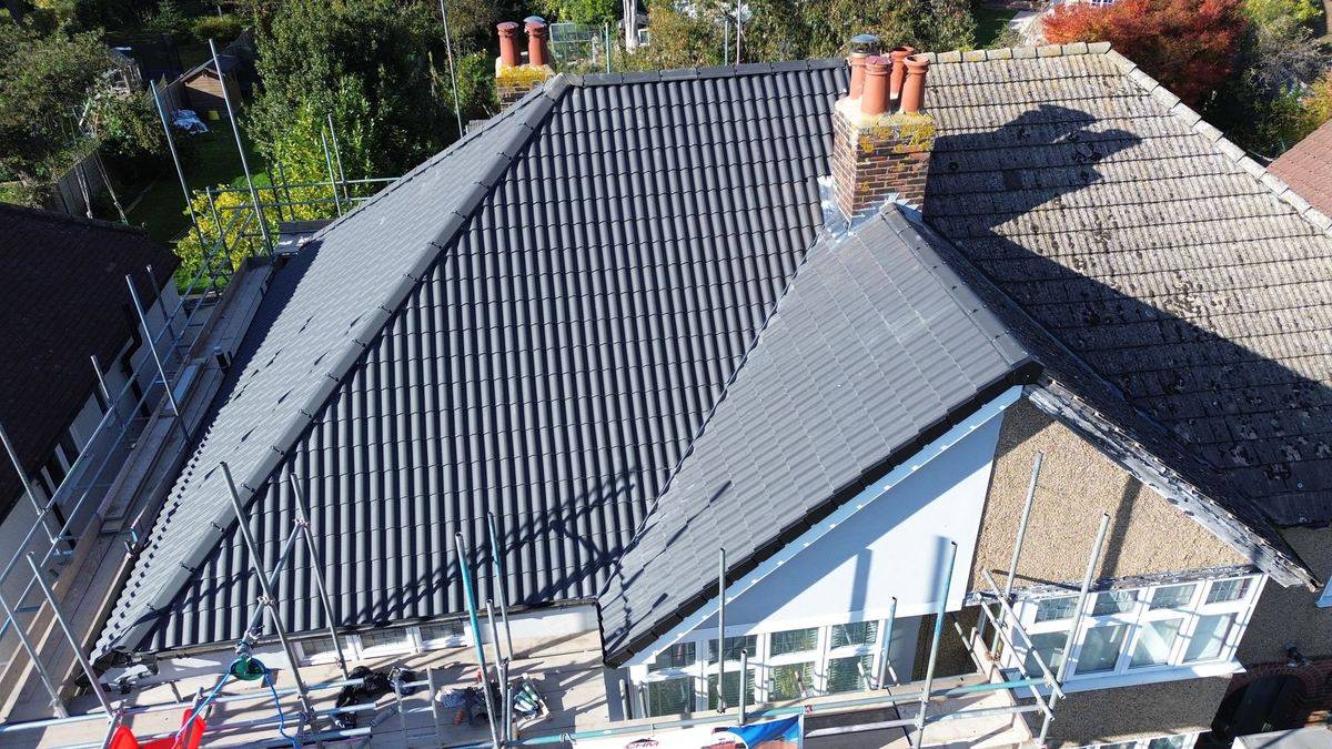 New grey tiled roof completed by CHM Roofing